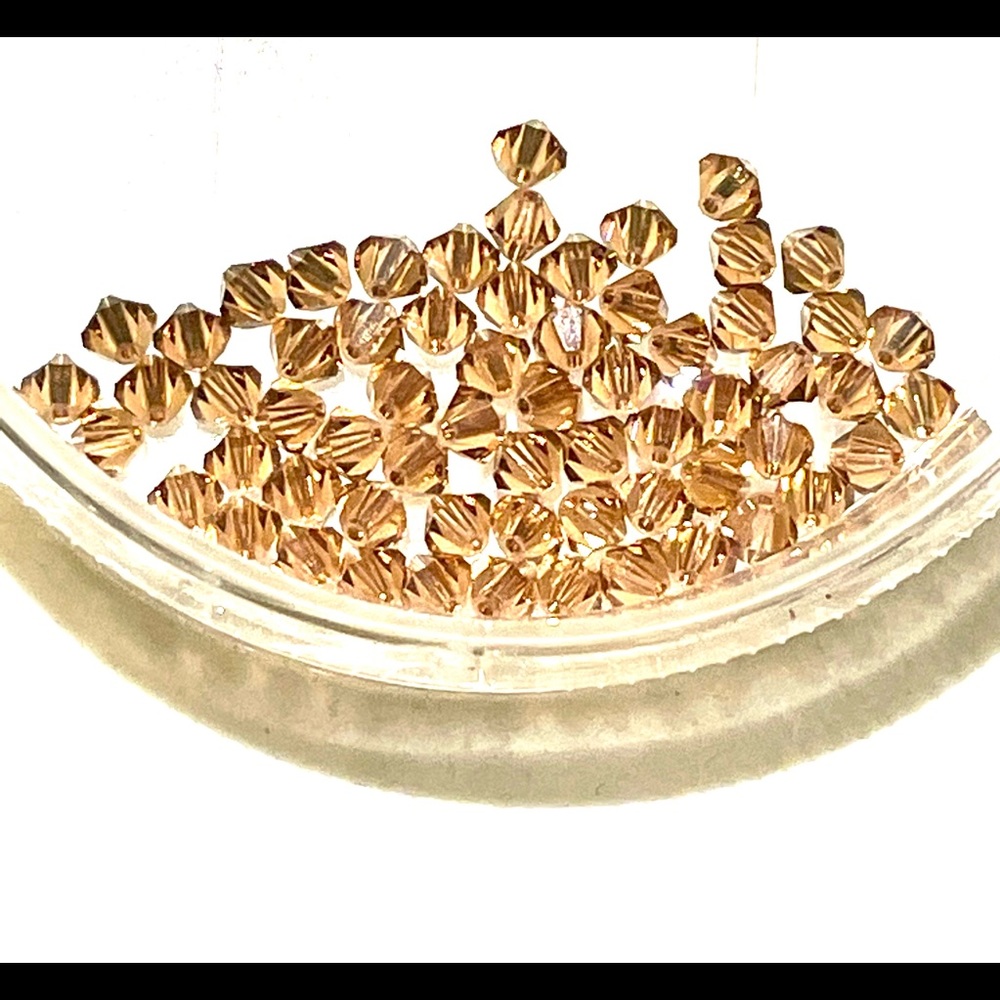 63 Amber colored Crystals